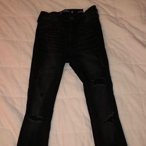 Black ripped Hollister skinny jeans. Size 0, w24